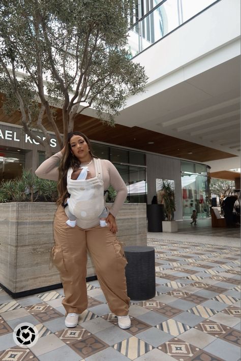 Wearing a size XL in the pants, large in the top and the baby carrier is from Artipoppe. Follow my shop @kristalheredia on the @shop.LTK app to shop this post and get my exclusive app-only content! #liketkit @shop.ltk Plus size style guide, cargo pants, abercrombie style, fall street style, midsize fashion, neutral outfit Street Style Midsize, Plus Size Cargo Pants Outfit, Abercrombie Style, Maternity Cargo Pants, Ootd Plus Size, Style Midsize, Plus Size Cargo, Children Names, Plus Size Cargo Pants