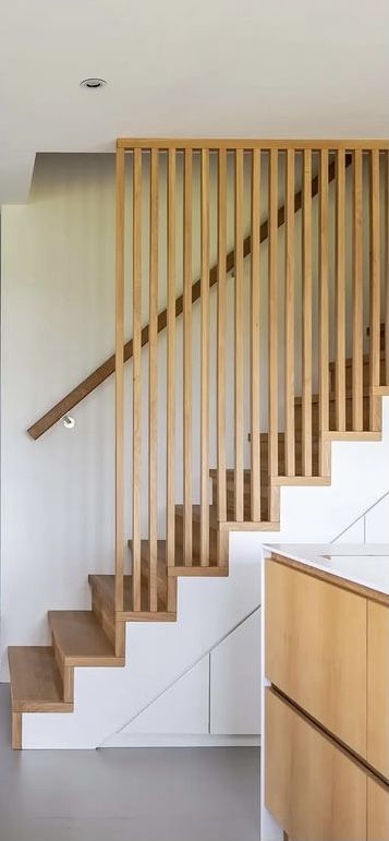 Slats On Staircase, Vertical Slats Staircase, Wooden Slat Staircase, Slat Railing Stairs, Slatted Banister, Slats On Stairs, 70s Bannister, Modern Stair Balustrade, Stairs With Wooden Slats