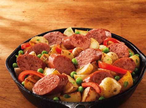 Hillshire Farm® Smoked Sausage and potatoes meet fresh vegetables in a hot skillet with delicate herbs. Bring something different to your dinner table. Beef Smoked Sausage Recipes, Beef Smoked Sausage Recipe, Beef Smoked Sausage, Sausage And Potatoes Skillet, Potato Skillet, Smoked Sausage Recipes, Pork Entrees, Skillet Potatoes, Veggie Dinner