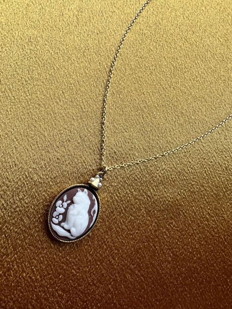 Calling all cat lovers https://etsy.me/3PC2o0v Cat cameo necklace is available at #CosmicCreatedMagic on #etsy #whitecat #cameo #goldnecklace #catlovers #cameosilhouette #catnecklace #whiteflowers #victorianjewelry #catjewelry #prettynecklace #catgifts Majestic Cat, Fluffy Kitty, Antique Gold Necklace, Two Flowers, Red Heart Earrings, Cameo Jewelry, Personalized Pendant, Cameo Necklace, Classy Jewelry