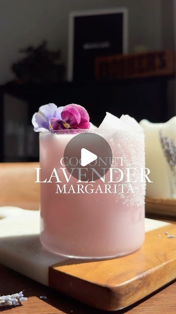 Nikki Sips 🤘🏻🍸 on Instagram: "If spring were a margarita, she’d be this one. 🤭🫶🏼

Now, I love lavender—as a scent.  To be honest, I was pretty skeptical about putting it in a cocktail BUT,  I’m glad I tried it bc this is my new favorite non-spicy margarita. 

It’s lightly floral, perfectly balanced, and how cute are those mini orchids?! (@the.boozy.ginger always uses them & I just had to borrow ‘em for this marg! 🌺🌸)

_____

Coconut Lavender Margarita

You’ll Need:
1 oz lavender syrup
1/2 oz orange liqueur
1.5 oz tequila
1 lime, juiced
1 oz coco Lopez cream of coconut
Agave 
Salt
Edible mini orchids

Prep your glass by painting with agave and dipping in salt.  In a shaker, combine lavender syrup, coconut, tequila, lime, and orange liqueur.  Shake for 10 seconds.  Strain into preppe Coconut Lavender Margarita, Lavender Drink, Coco Lopez, Lavender Syrup, Cocktail Appetizers, Spicy Margarita, Specialty Cocktail, Cocktails To Try, Cocktail And Mocktail