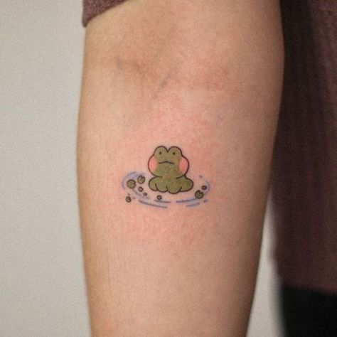 We will help you to discover the world of frog tattoos with 80+ designs and explore their deep symbolism and cultural significance in this tattoo guide. Cute Frog Tattoo, Frogs Tattoo, Frog Tattoo Ideas, Print Making Designs, Cute Animal Tattoos, Tattoo Guide, Stunning Tattoos, Frog Tattoo, Henna Ideas