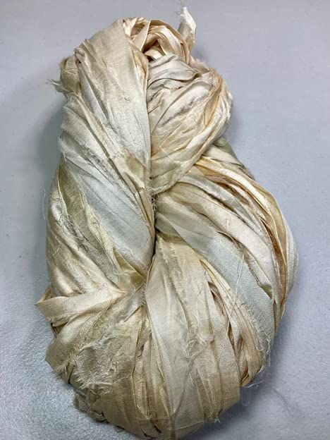 PRICES MAY VARY. Recycled sari silk ribbon yarn 100% silk yarn Real 100% pure silk ribbon, Ribbon is sewn end to end to make a continuous ribbon, frayed and can be tangled because of hand made nature. Multicolored sari silk ribbon yarn Amount: 50-60 yards / 100 grams hank Content: 100% Silk Weight: Bulky Amount: 50-60 yards / 100 grams hank Care: Hand Wash and Dry Flat This yarn is made of pure silk and is approximately an inch wide throughout. Due to its handmade nature there might occasionally Sari Silk Ribbon, Fabric Dyeing, Recycled Sari Silk, Needle Embroidery, Ribbon Yarn, Creative Spaces, Punch Needle Embroidery, Vintage Junk, Textile Arts