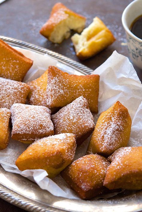 Classic Beignets Recipe - This recipe makes the traditional beignet, a signature yeast-raised breakfast treat native to New Orleans. Incredibly strong black coffee laced with chicory is the classic accompaniment. Top with mountains of confectioners sugar! Beignet Recipe, King Food, Fry Bread, Fried Dough, King Arthur Flour, A Signature, King Arthur, Breakfast Treats, Beignets