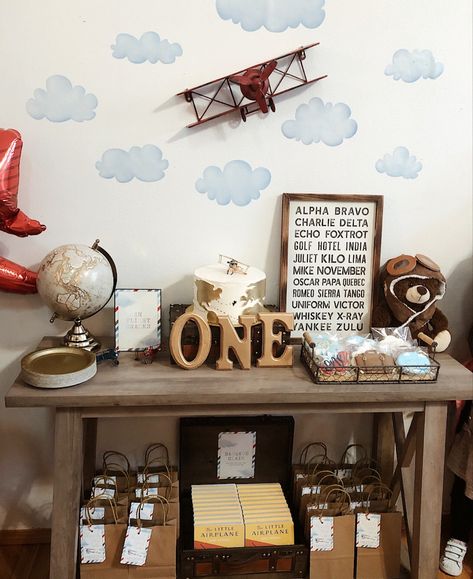 Time flies when you’re having fun! My son loves airplanes and I felt it was very fitting to throw him a vintage airplane themed party! Aviator First Birthday Party, Vintage Plane Party Decor, Vintage Airplane Party Decorations, Vintage Aviation Birthday Party, My Oh My How Time Flies Birthday, Aviator Birthday Party, Plane Party Decorations, Vintage Airplane First Birthday Party, Time Flies One Year Birthday