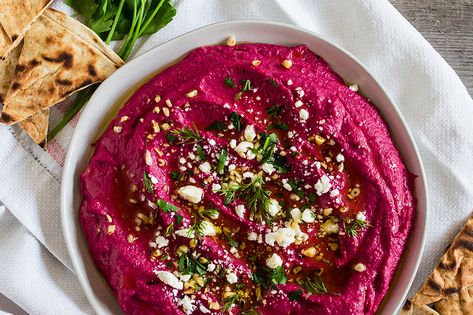 Roasted Garlic Beet Hummus | BUSH’S® Beans Beet Hummus Recipe, Beet Dip, Roasted Beet Hummus, Meat And Cheese Tray, Homemade Dips, Beet Hummus, Roasted Walnuts, Layer Dip, Feta Dip