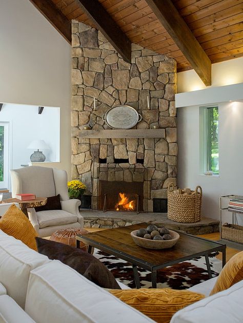 Mountain Cabin Living Room, Corner Stone Fireplace, Farmhouse Fireplace Ideas, Boston Living Room, Installing A Fireplace, Stone Fireplace Designs, Gorgeous Fireplaces, Cabin Living Room, Build A Fireplace