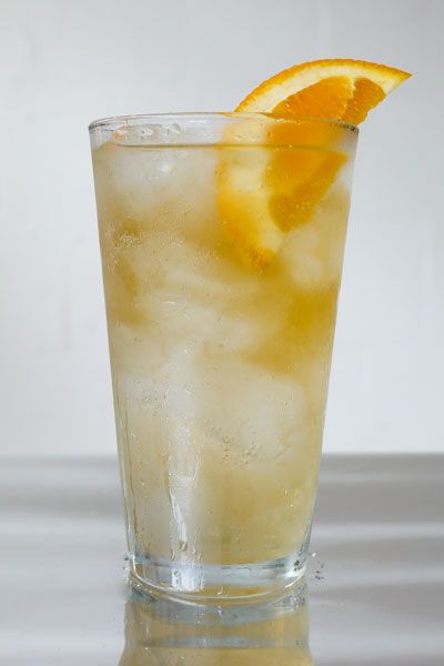 Sparkling Bourbon Tea Cocktail - Polar Seltzer Bourbon Tea Cocktail, Bourbon Tea, Polar Seltzer, Sliced Oranges, Bourbon Cocktail Recipe, Fresh Orange Juice, Black Tea Bags, Orange Wedges, Blended Drinks