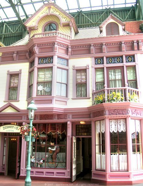 Store Front Windows, Pink Victorian, All Letters, Shop Fronts, Victorian Architecture, Tokyo Disneyland, Pink Houses, Disney Theme Parks, Postage Stamp