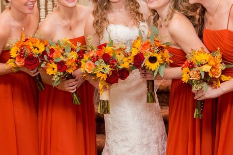 Fall wedding colors, Red, Orange, Yellow Wedding Flowers, photo by Idalia Photography, NJ wedding photographer, visit www.idaliaphotography.com Burnt Orange Weddings With Sunflowers, Red Orange Yellow Wedding Decor, Red Yellow And Orange Wedding, Fall Wedding Colors Red, Yellow Orange Wedding, Burgandy Bridesmaids Dress, Hoco Flowers, Sunflower Bridesmaid Bouquet, Yellow Wedding Decorations