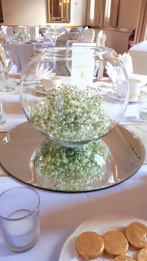 Glass Bowl Centerpieces Wedding, Mirror Centerpiece Wedding, Fish Bowl Wedding Centerpieces, Goldfish Bowl Ideas, Goldfish Bowl Centerpiece, Gypsophila Centrepieces, Wedding Centerpieces Baby's Breath, Mirror Centerpiece Ideas, Glass Bowl Decor Ideas Centerpieces