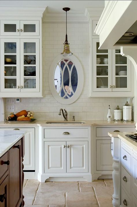 geometrical shapes near the sink like oval and rectangular cabinets Blank Wall Over Kitchen Sink, Mirror In Front Of Kitchen Sink, Kitchen Sink In Front Of Wall, Windowless Kitchen Sink, Mirror Over Kitchen Sink, Sink With No Window, Window Above Kitchen Sink, Windowless Kitchen, Light Cabinets