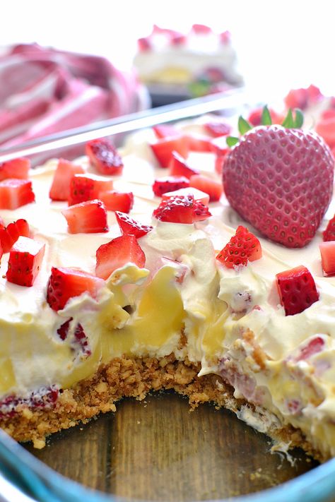 This Strawberries & Cream Lush Dessert combines a crunchy cookie crust with vanilla pudding, whipped topping, and fresh strawberries for a delicious summer treat that's guaranteed to become a favorite! Vanilla Pudding Desserts, Lush Dessert, Lush Cake, Lush Recipes, Yummy Deserts, Strawberry Dessert Recipes, Stick Butter, Fruity Desserts, Pudding Desserts