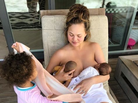 Chrissy Teigen Issued Her Best Clapback Yet After Sharing This Breastfeeding Pic | Glamour Mother Feeding Baby, Emrata Instagram, Twins Instagram, Breastfeeding Twins, Emma Heming, World Breastfeeding Week, Breastfeeding Week, Mother Feeding, Elsa Hosk