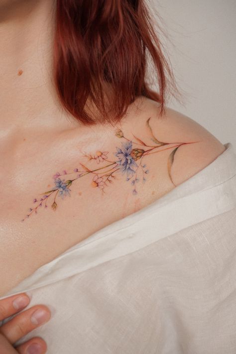 Collar Bone Tattoo Color, Collarbone Tattoo Flower, Cornflower Tattoo Minimalist, Watercolor Wildflower Tattoo, Floral Collarbone Tattoo, Collarbone Flower Tattoo, Cornflower Tattoo, Flower Collar Bone Tattoo, Tattoo Collarbone