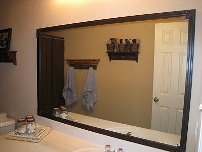 this is what we need!! Cheaper than replacing boring mirrors with framed mirrors. Buy "Mirredge" at Home Depot and just frame the mirror!  YES! Mirror Border Diy, Modern Shower Design, Mirror Frame Diy, Shanty 2 Chic, Bathroom Mirror Frame, Home Decor Bathroom, Deco Bathroom, Home Fix, Tv Decor