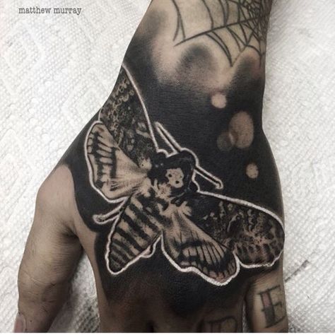 Moth tattoo by Matthew Murray (on insta @ blackveiltattoo) Moth Shoulder Tattoo, Black Moth Tattoo, Inverted Tattoo, Black Veil Tattoo, Veil Tattoo, Hand Tattoo Cover Up, Negative Tattoo, Backpiece Tattoo, Blackout Tattoo