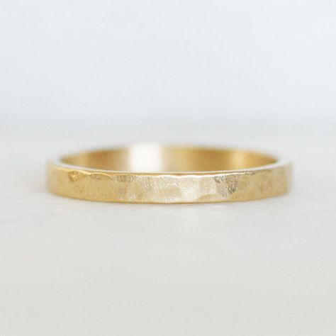 Classic hammered band made from modern flat gold.  Perfect as a wedding band, and also amazing as a stacking ring! Details: Band - Flat gold, 2.5mm x 1.25mm Gold - 14k yellow gold.  (also available in 18k gold...please ask for pricing) **Please note the photos are enlarged on your computer screen. Please refer to a ruler with the dimensions I have listed to ensure you are aware of the exact scale of the item before purchasing. Thank you! **This ring is made to order.  **Please see shop announcem Flat Gold Wedding Band, Brushed Gold Wedding Band, Hammered Gold Wedding Band, Hammered Wedding Bands, Gold Stacking Ring, Yellow Gold Wedding Band, Hammered Band, Dream Engagement Rings, Hammered Gold