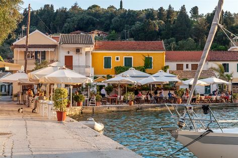 A seafront tavern in Lakka, Paxos.    #travel #Paxos #TheThinkingTraveller #holiday Corfu Airport, Romantic Views, Paxos Greece, Paxos Island, Holiday Greece, Corfu Town, Villa With Pool, Luxury Villa Rentals, Breathtaking Places