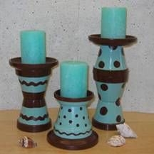 Clay pot candlesticks.... There are several ideas for using clay pots...and very cute! Check it out! Clay Pot Candle Holders, Clay Pot Candle, Flower People, Pot Craft, Gardening Crafts, Pot Heads, Three Angels, Everyday Crafts, Vase Ideas