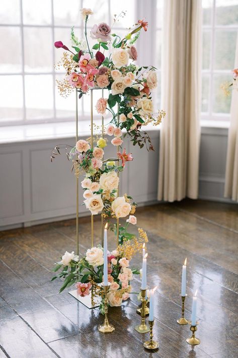 Every Pastel-Loving Bride Will Fall Head Over Heels for This Whimsical Wedding Inspiration Wedding Alter Floral Pillars, Wedding Flowers Pillars, Gold Flower Stands Wedding, Wedding Ceremony Flower Pillars, Sculptural Wedding Flowers, Wedding Pillar Flowers, Floral Pillars Wedding Ceremony, Floral Columns Wedding, Wedding Flower Pillars