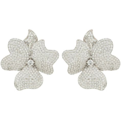 Ideal for those who love statement jewellery with added sparkle. Make these floral inspired earrings your new timeless treasures. These large flower stud earrings are adorned with sparkling cubic zirconia which add a touch of sophisticated style to any outfit.  Pierced earrings with post back and butterfly fastening. M Pearl Long Necklace, Silver Bridal Jewellery, Large Stud Earrings, Stud Earrings Silver, Silver Flower Earrings, Necklace Flower, Flower White, Statement Jewellery, Flower Stud Earrings