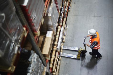 Warehouse Loader at Work. Above view of warehouse loader using forklift cart to , #AD, #view, #warehouse, #Work, #Warehouse, #Loader #ad Factory Photography, Tire Storage, Things To Watch, Warehouse Worker, Corporate Portrait, Corporate Photography, Industrial Photography, Security Systems, Business Portrait