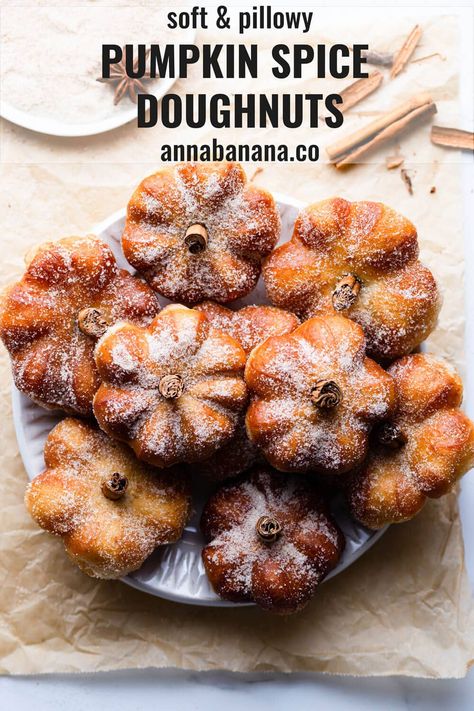 These extra soft and pillowy pumpkin spice doughnuts are made with enriched dough, a creamy pumpkin spice filling and coating of cinnamon sugar for an extra crunch. They are also shaped like mini pumpkins, making them the most adorable treat for Halloween or any seasonal gatherings! annabanana.co Pumpkin Spice Doughnut Recipe, Baked Mini Pumpkin Donuts Recipe, Pumpkin Cheesecake Donut, Pumpkin Spice Cheesecake Donuts Recipe, Pumpkin Spice Doughnuts Fried, Fun Doughnut Ideas, Pumpkin Spice Breakfast, Unique Pumpkin Recipes, Pumpkin Pastry Recipes