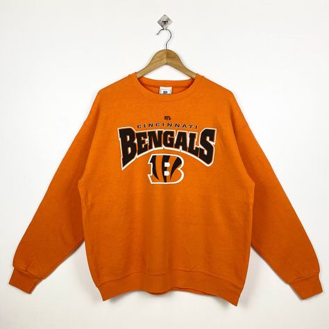 Vintage NFL Cincinnati Bengals Crewneck Sweatshirt Print Logo Orange Color Men’s L by OzzyVintageShop on Etsy Bengals Crewneck, Sweatshirt Print, Cincinnati Bengals, Print Logo, Printed Sweatshirts, Cincinnati, Nhl, Orange Color, Mens Sweatshirts