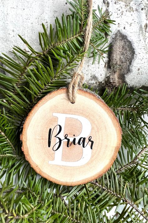 Excited to share this item from my #etsy shop: Name Ornament | Personalized Reclaimed Wood Ornament | Wood Slice Name Ornament | Family Ornament | Christmas Ornament #christmas #name2022 #christmasornament #sweetlittlespruce #woodsliceornament #farmhousechic #christmasdecoration #weddingornament #nameornament Wood Slice Ornament Ideas Cricut, Personalized Wood Slice Ornaments, Diy Name Ornaments, Wood Cookies, Name Christmas Ornaments, Ornament Cookies, Cone Christmas Trees, Ornament Family, Shop Name