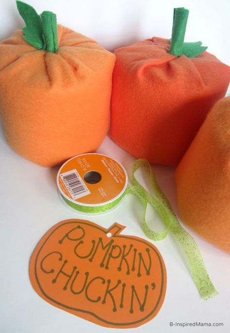 Make a DIY Pumpkin Halloween Party Game for kids! Super cute and fun to play for kids of all ages. Perfect for a fall harvest festival or party, too. #kids #halloween #fall #fallfun #pumpkins #halloweenparty #playmatters Games With Pumpkins, Pumpkin Chuckin, Pumpkin Toss Game, Pumpkin Chunkin, Fall Festival Games, Pumpkin Games, Fall Carnival, Pumpkin Diy, Harvest Fest