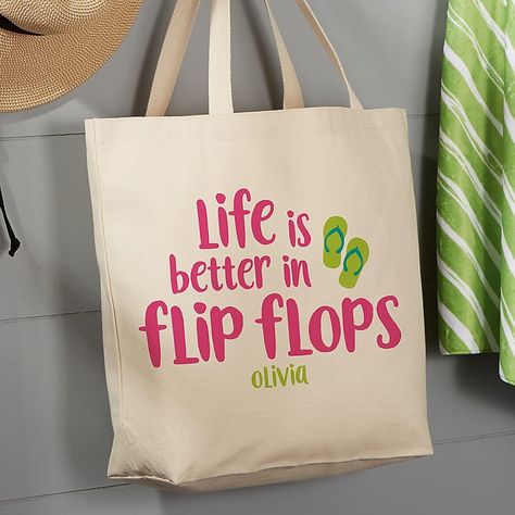 Personalizationmall "life Is Better In Flip Flops" Tote Bag In Tan - Easily bring your gear to the beach or pool with the "Life Is Better In Flip Flops" Tote Bag. Lght canvas design is easy to carry and can be personalized with a name of your choice. Convenient straps can be held or thrown over your shoulder. Flip Flop Quotes, Totes Ideas, Personalized Flip Flops, Personalized Canvas Tote, Purse Hanger, Sublimation Ideas, Personalized Canvas, Personalized Tote Bags, Personalised Canvas