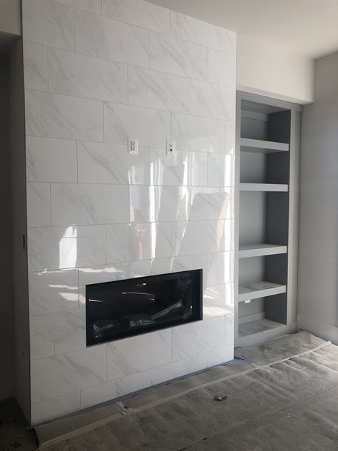 24x48 Tile Fireplace, White Tile Fireplace Surround, White Marble Tile Fireplace, Tile Chimney, Chimney Ideas, Tiled Fireplace Wall, Tile Fireplaces, Fireplace Office, Modern Fireplace Ideas Living Rooms