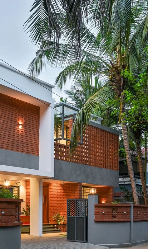 Brick Screen House At Malappuram | HONEYCOMB architects | Archello Brick Screen, Brick Roof, Door Design Photos, Concrete Interiors, Brick Cladding, Screen House, Facade Cladding, Building Elevation, Beautiful House Plans