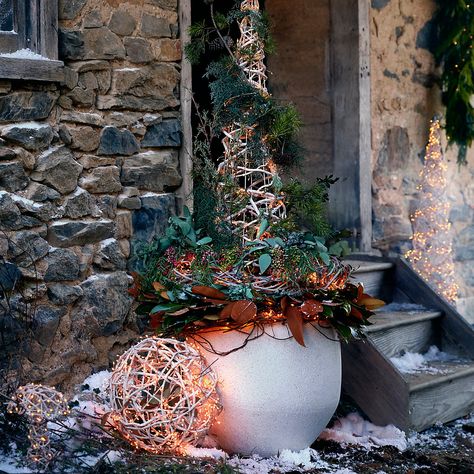 Terrain Christmas, Silver Tinsel Tree, Patio Container Gardening, Tall Lanterns, Outdoor Christmas Planters, Outdoor Living Furniture, Christmas Planters, Magnolia Leaves, Creative Living