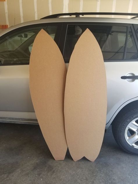 Diy Surf Party Decorations, Summer Beach Theme Party Decorations, Cardboard Surfboard Decoration, How To Make A Surfboard Out Of Cardboard, Wave Party Decorations, Tropical Party Ideas For Adults, Diy Cardboard Surfboard, Surfer Party Decorations, Surfing Centerpieces