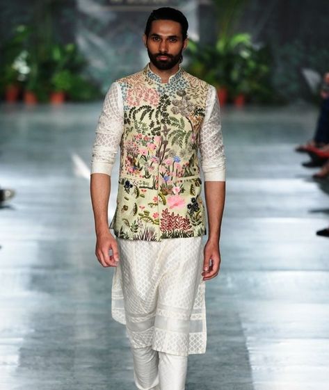 A vibrantly embroidered nishat bandi that gives totes mehndi vibes! #nehrujacket #indian #designer #groom #fashion #men #modern #indianweddings #indianwear #latest #style groomwear Outfit Styling Ideas, Sherwani For Groom, Mens Traditional Wear, Waistcoat Designs, Mens Indian Wear, Sherwani For Men Wedding, Wedding Kurta For Men, Rahul Mishra, Groom Fashion