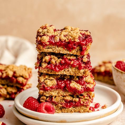 Incredible raspberry bars made with an oatmeal cookie crumble and a fresh raspberry jam filling. These gluten free raspberry pie bars are easy to make and perfect for using up fresh or frozen raspberries! Enjoy them at room temp or straight from the fridge for a wonderful summertime treat. Bar Recipes Easy, Bars With Oatmeal, Whole Grain Gluten Free, Berry Crumble Bars, Raspberry Crumble Bars, Jam Bars, Healthy Oatmeal Breakfast, Raspberry Crumble, Cookie Crumble