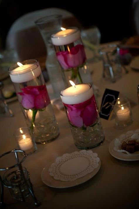 Candle Stand Decor Ideas, Candle Stand Ideas, Pink Flower Centerpieces, Wedding Decorations Candles, Black Centerpieces, Silver Wedding Decorations, Candles Ideas, Table Arrangements Wedding, Hot Pink Weddings