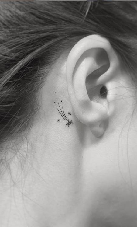 35 Trendy Shooting Star Tattoos, Ideas, Designs & Meanings - Tattoo Me Now Neck Minimalist Tattoo, Small Behind Ear Tattoos For Women, Star Tattoos Behind Ear, Playground Tattoo, Star Tattoo Meaning, Shooting Star Tattoo, Behind Ear Tattoos, Tato Minimal, Star Tattoo Designs