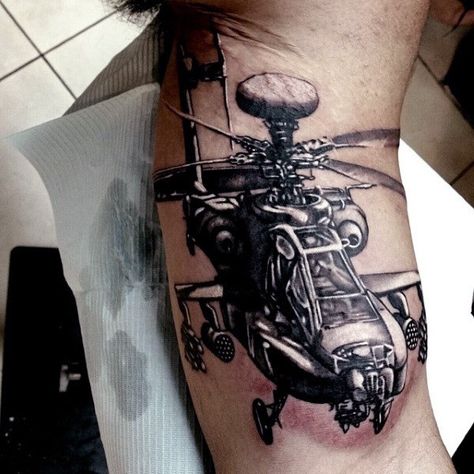 Awesome Apache Helicopter Army Bicep Tattoos For Guys Apache Helicopter Tattoo, Connected Tattoos, Army Tattoos For Men, Helicopter Tattoo, Bicep Tattoos, Pilot Tattoo, Shoulder Armor Tattoo, Apache Helicopter, Meaning Tattoos