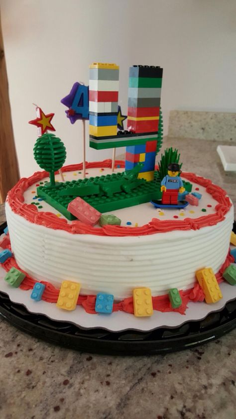 Used my sons favorite Lego guy and crocodile on top of a DQ ice cream cake and some Lego candies for a quick bday cake. Lego Ice Cream Cake, Lego Ice Cream, Dq Ice Cream Cake, Dq Ice Cream, Cake Lego, Lego Candy, Lego Cake, Lego Man, Candy Cake