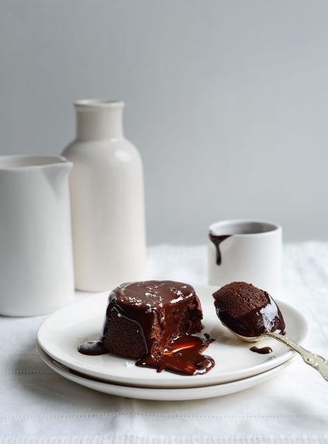 Chocolate is always a good idea, especially when it’s a mousse-like soufflé: light in texture and darkly rich at the same time. Smothered in chocolate whiskey sauce and dusted with a few flakes of sea salt, these soufflés make an impressive yet simple dinner party dessert. Souffle Aesthetic, Dark Chocolate Sauce Recipe, Dark Chocolate Sauce, Light Food Photography, Chocolate Sauce Recipe, Whiskey Chocolate, Dinner Party Desserts, Souffle Recipes, Photography Food Styling