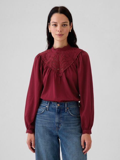 Soft cotton embroidered top.  Mockneck with eyelet detail.  Long puff sleeves with eyelet cuffs.  Fit: Classic.  A straight & easy fit.  Hits at the hip.  Models wearing Gap Dressing Professional, Paris Paloma, Crochet Long Sleeve Top, Christmas Closet, Crochet Cuffs, Crochet Long Sleeve Tops, Women Fall Tops, Embroidered Cotton Top, Red Crochet