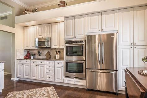 awesome cabinets double ovens, fridge and microwave set up in white kitchen ♥ Double Oven Next To Stove Top, No Upper Cabinets Kitchen, Kitchen No Uppers, Kitchen No Upper Cabinets, Oven Wall, No Upper Cabinets, Double Oven Kitchen, Gas Range Double Oven, Oven Kitchen