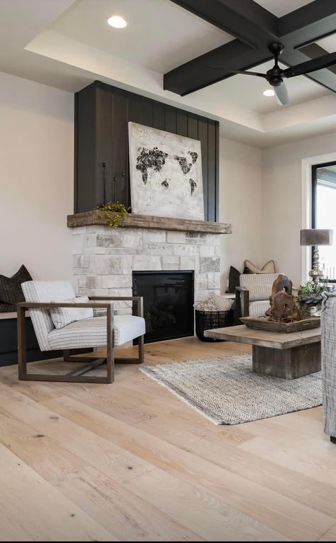 Stone Black Fireplace, Fireplace With Rock And Shiplap, Decor On Side Of Fireplace, Black And Stone Fireplace, Dark Rock Fireplace, Cool Fireplace Ideas, Fireplace Half Stone, Quad Level Home Remodel, Hidden Tv Above Fireplace