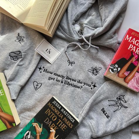 Any fans of Magnolia Parks?? New design 👀 #daisyhaites #bookstagram #books #windowshopping #books #smallbusiness #booktok #bookstagram #bookstagramuk #booktok #bookmerch #bookishgifts #bookclothing #moodreader #bigbookenergy #magnoliaparks Book Sweatshirts, Bookish Sweatshirts, Booktok Merch, Embroidered Book, Magnolia Parks, Book Merch, Magnolia Park, Bookish Merch, Reading Aesthetic