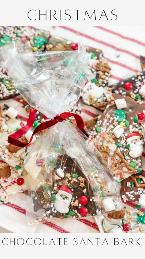 170K views · 10K reactions | Spread holiday cheer with delicious homemade Christmas chocolate bark! 🎄🍫 Follow these simple steps to create delightful gifts for your loved ones. Instructions: -Lay out dark, milk, and white chocolate bars on a parchment-lined baking sheet. Preheat the oven to 100 degrees and let the chocolates gently melt for 5-10 minutes, laying the foundation for your delightful Christmas chocolate bark -Once melted, use a fork or skewer to mix and marbleize the chocolates on the baking sheet. -Sprinkle whatever toppings you enjoy!! I used crushed peppermint, candy, biscotti, marshmallows, pretzels and festive sprinkles over the marbled chocolate for a burst of holiday flavor. -Create an extra magical touch by adding some edible gold glitter dust to your bark before y Snowman Bark Candy, White Chocolate Christmas Bark, Chocolate Christmas Bark, Marshmallow Bark, Christmas Chocolate Bark, Janine Graff, White Chocolate Bars, Chocolate Bark Christmas, Holiday Bark