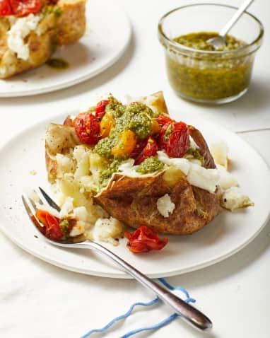 Summer Baked Potatoes with Ricotta, Blistered Tomatoes & Pesto | Kitchn Blistered Tomatoes, Baked Good, Tomato Salad Recipes, Green Pesto, Good Recipes, Summer Baking, Tomato Pesto, Juicy Tomatoes, Healthy Veggies