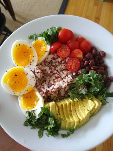 soft boiled eggs, cherry tomatoes, black beans, avocado, cilantro, quinoa rice blend Cilantro Quinoa, Quinoa Rice, Egg Bowl, Rice Beans, Soft Boiled Eggs, Black Rice, Breakfast Bowl, Bean Salad, Egg Salad